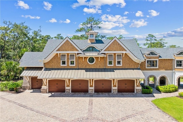 view of front of home with a garage