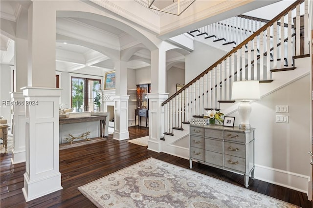 entryway with crown molding, coffered ceiling, dark hardwood / wood-style floors, and beamed ceiling