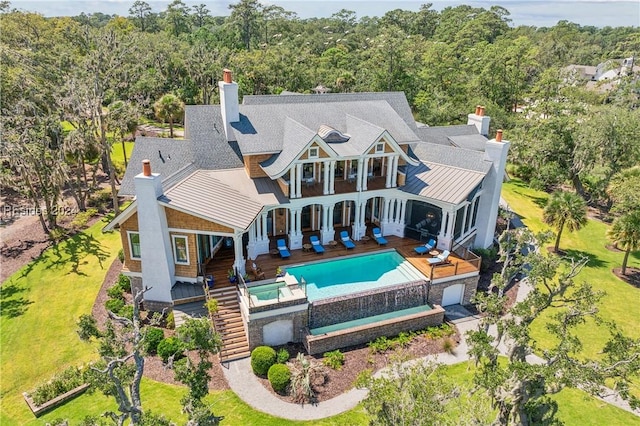 rear view of house featuring a patio