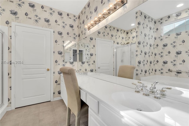 bathroom with tile patterned flooring, vanity, and separate shower and tub