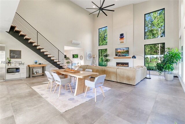 dining room with a high ceiling