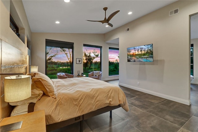 bedroom featuring vaulted ceiling and ceiling fan