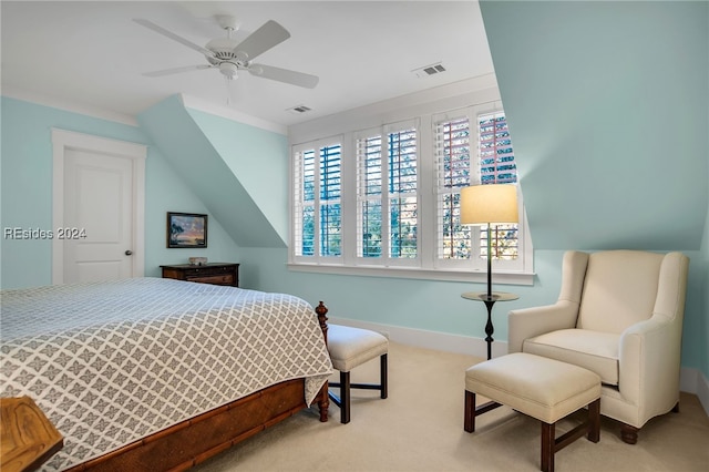 bedroom with light colored carpet and ceiling fan