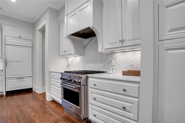 kitchen with white cabinetry, ventilation hood, dark wood-type flooring, and high end stove