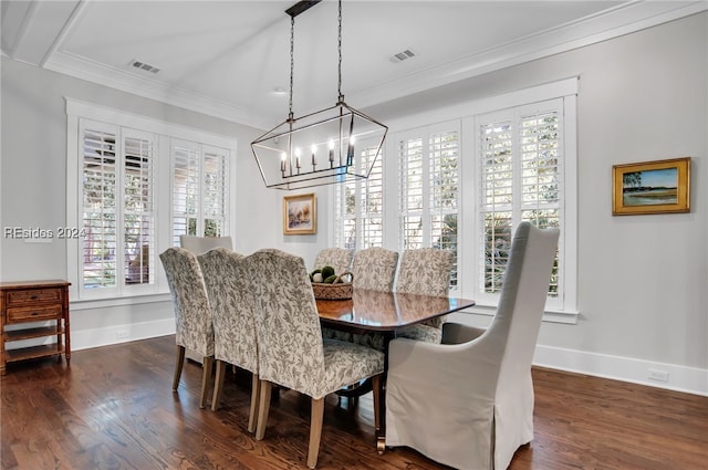 dining space featuring dark wood-type flooring and ornamental molding