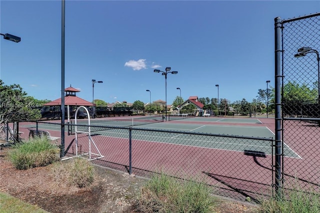 view of sport court with a gazebo