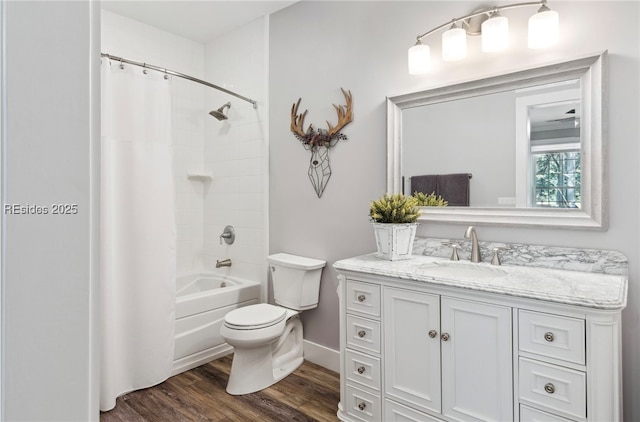 full bathroom featuring wood-type flooring, toilet, shower / tub combo, and vanity