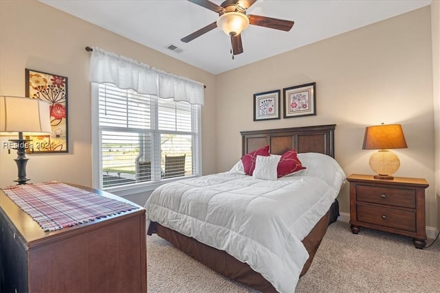 carpeted bedroom with ceiling fan