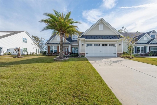 view of front of home with a garage and a front yard