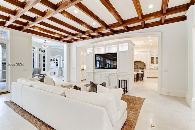 living room featuring beamed ceiling and coffered ceiling