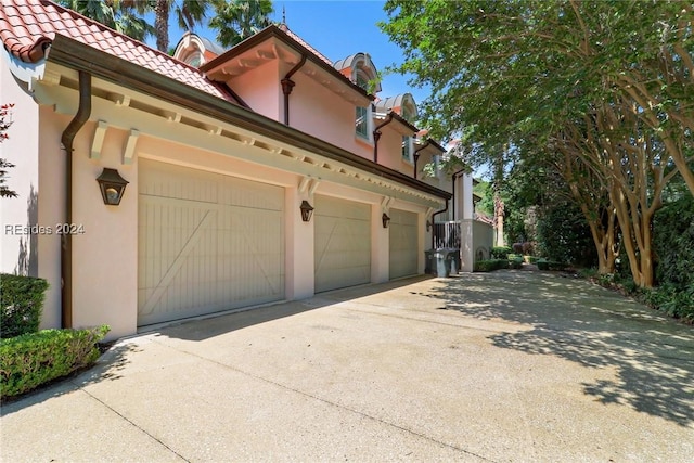 view of home's exterior featuring a garage