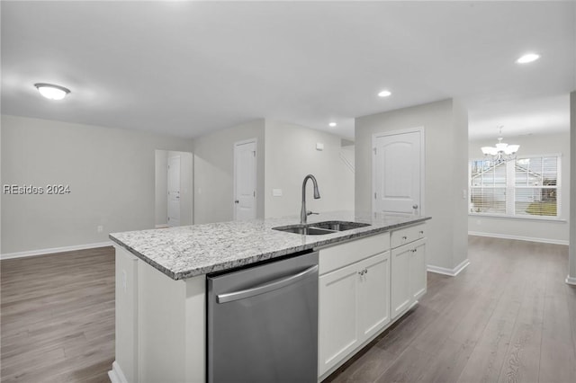 kitchen with white cabinetry, wood-type flooring, sink, an island with sink, and stainless steel dishwasher