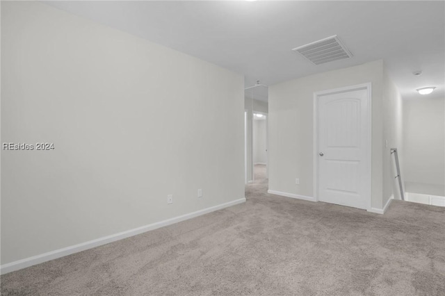 spare room with carpet