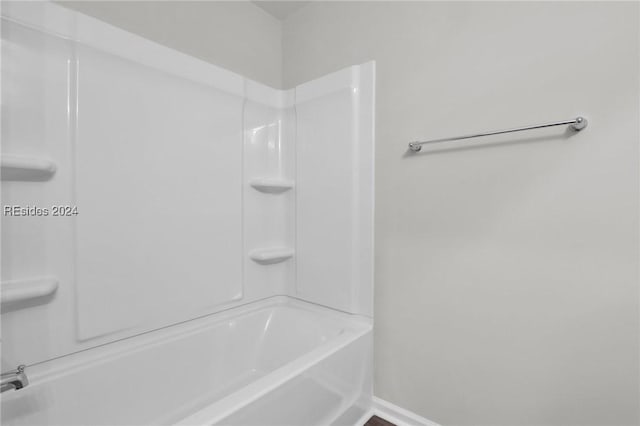 bathroom featuring washtub / shower combination