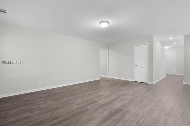 empty room featuring hardwood / wood-style floors