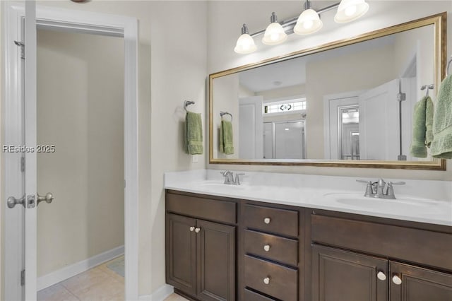 bathroom featuring vanity, tile patterned floors, and walk in shower