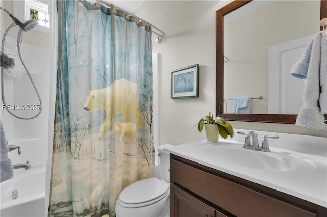 full bathroom with shower / tub combo with curtain, vanity, and toilet