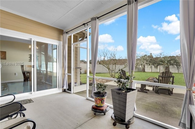 sunroom featuring a healthy amount of sunlight