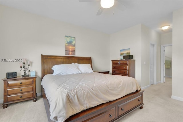 bedroom with light colored carpet and ceiling fan