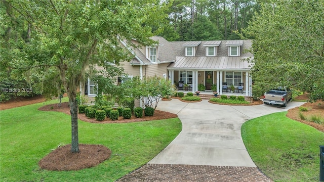 view of front of property with a front lawn and covered porch