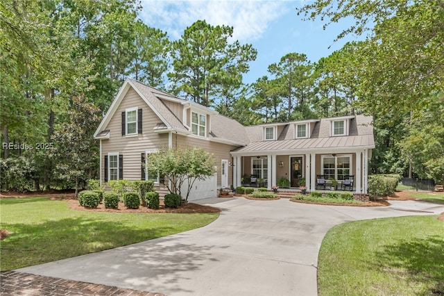 view of front of home featuring a front yard and covered porch