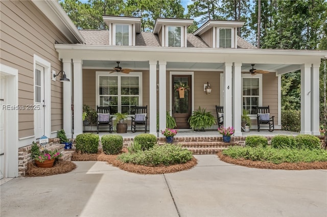 property entrance with a porch and ceiling fan