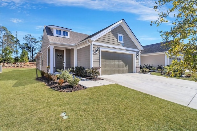 view of front facade with a garage and a front yard