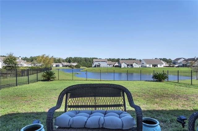 view of yard with a water view