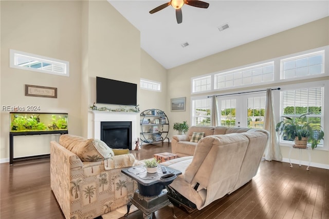 living room featuring ceiling fan, dark wood-type flooring, high vaulted ceiling, and french doors