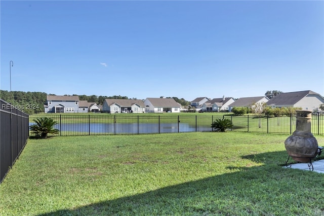 view of yard with a water view