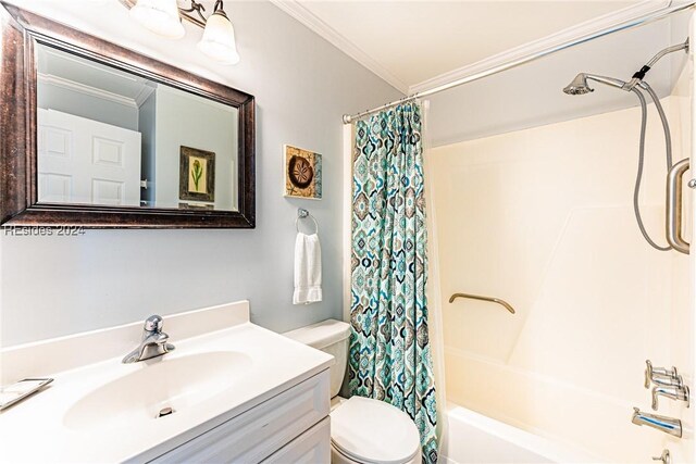 full bathroom with ornamental molding, toilet, shower / tub combo, and vanity