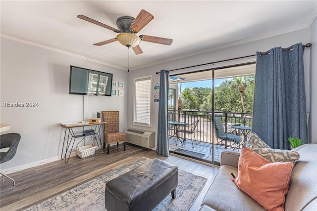 living room featuring ceiling fan, ornamental molding, a wall mounted air conditioner, and hardwood / wood-style floors