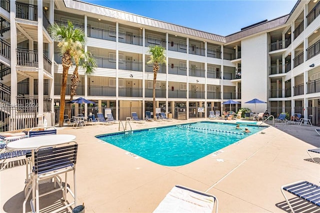 view of pool with a patio