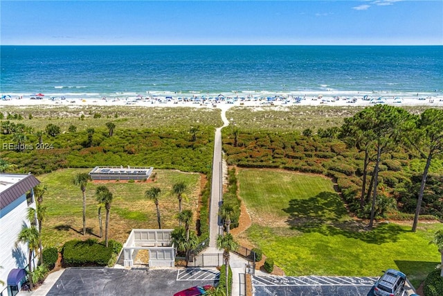 bird's eye view with a beach view and a water view