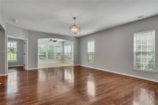 spare room featuring dark hardwood / wood-style floors and a wealth of natural light