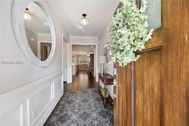 foyer entrance featuring ornamental molding