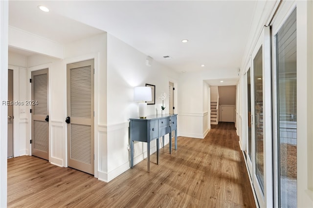 corridor featuring hardwood / wood-style floors