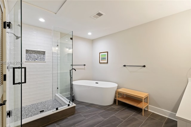 bathroom featuring plus walk in shower