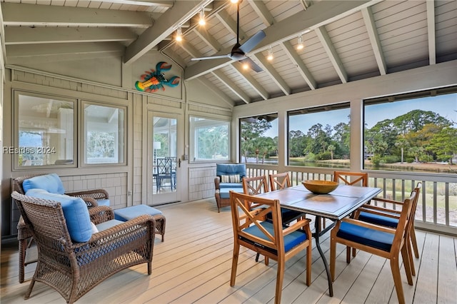 sunroom / solarium featuring wood ceiling, ceiling fan, track lighting, and vaulted ceiling with beams