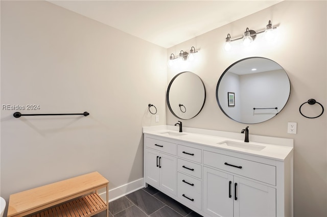 bathroom with tile patterned flooring and vanity