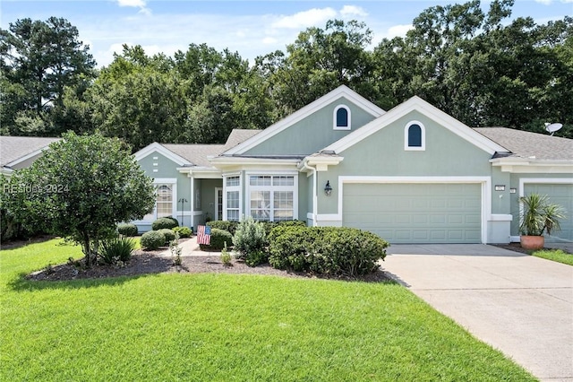 ranch-style home with a garage and a front yard