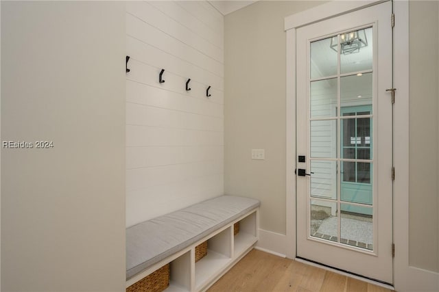 mudroom with light hardwood / wood-style flooring