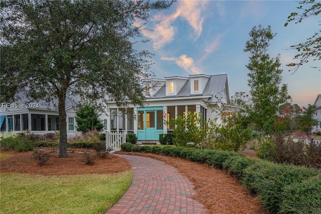 view of new england style home