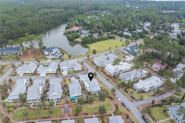 birds eye view of property featuring a water view