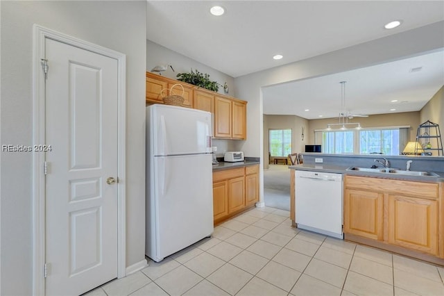 kitchen with light brown cabinetry, sink, hanging light fixtures, light tile patterned floors, and white appliances