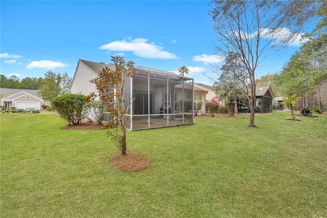 view of yard with glass enclosure