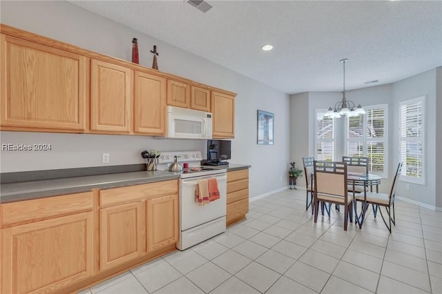 kitchen with light tile patterned flooring, decorative light fixtures, a chandelier, light brown cabinets, and white appliances