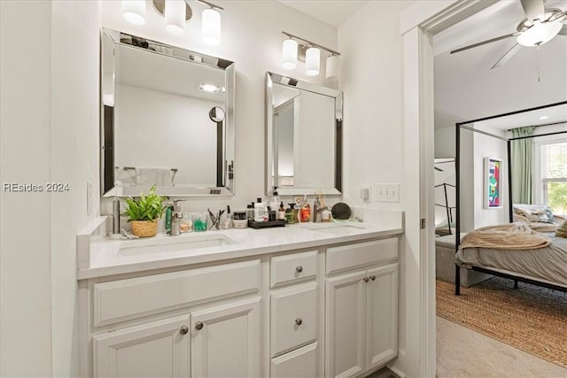 bathroom featuring vanity and ceiling fan