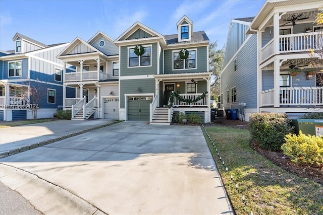 townhome / multi-family property with a porch and a garage