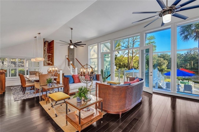 sunroom with lofted ceiling and ceiling fan